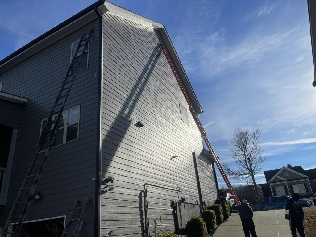 ladder on exterior of house for painting