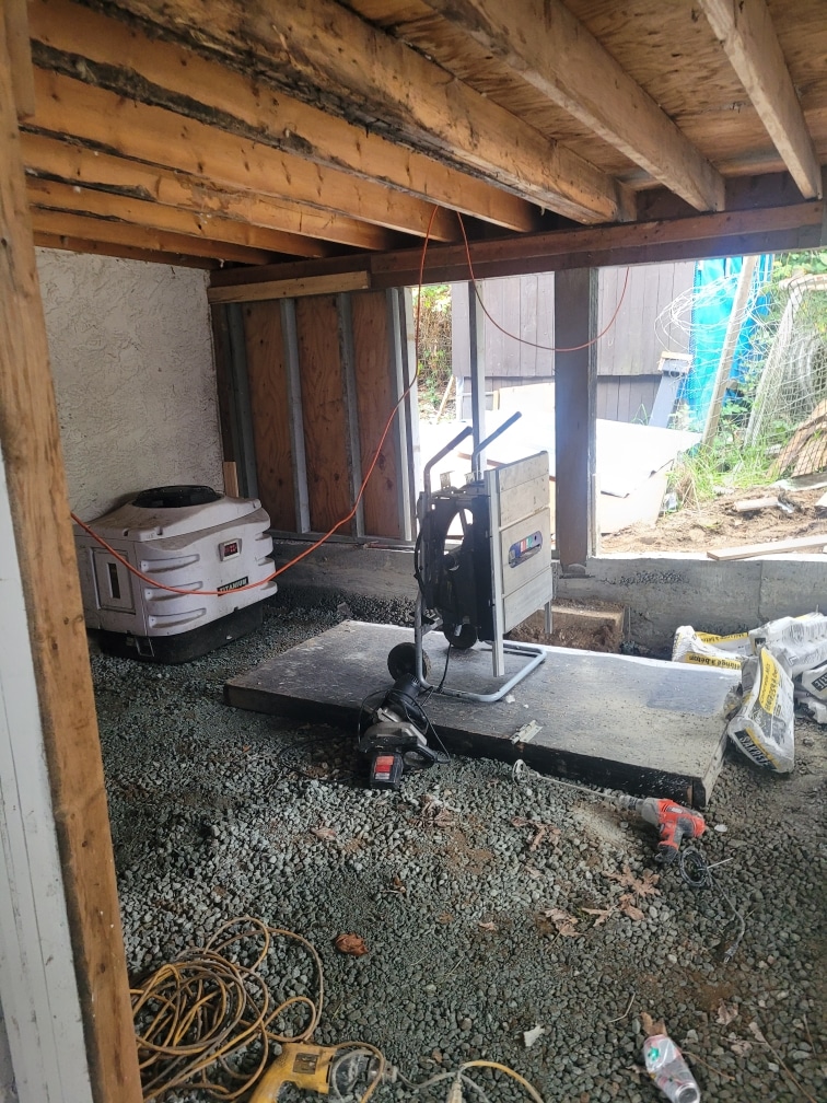 Pouring concrete under deck